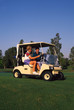 couple golfing