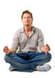 young handsome man meditating