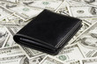 wallet on dollars background