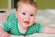 Photo: baby boy on bed baby boy on bed