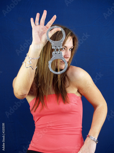young woman with handcuffs young woman with handcuffs