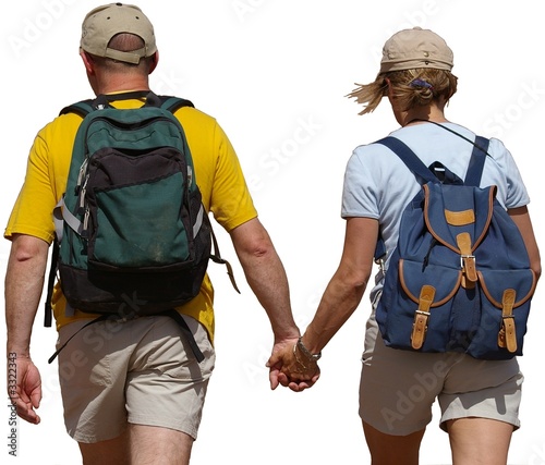 couple de randonneurs se tenant la main