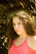 teenage caucasian girl in shorts and tank top
