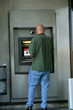 man at atm machine man at atm machine