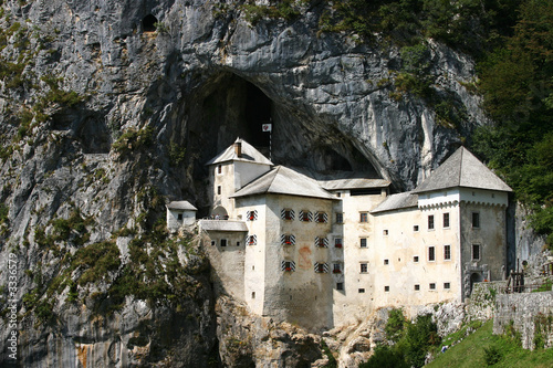 predjama castle hanging out of rock predjama castle hanging out of rock