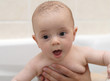 happy baby in bath