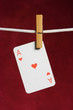 heart ace with clothes peg on rope