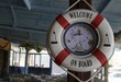 Life buoy with the welcoming sign at the entrance of the taverna