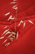 red cushions and dry plant
