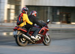pair on a motorcycle.
