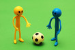 ����: two smilies playing football on green pitch � Elnur #3445386