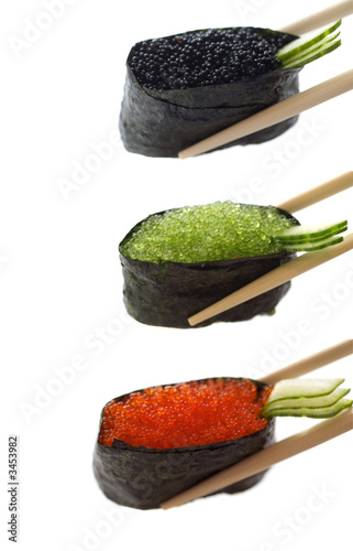 sushi with chopsticks shot on white
