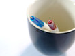 the ball-point pen & the cup