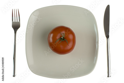 Photo: plate with tomato. isolated on white. plate with tomato. isolated on white.