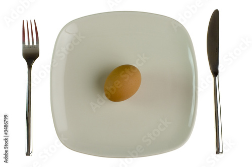 Photo: plate with egg. isolated on white. plate with egg. isolated on white.