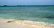 isolated beach with the ocean surf