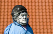 old ancient stone statue used as a scarecrow 01 old ancient stone statue used as a scarecrow 01