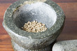 white pepper in a mortar