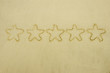five stars in sand