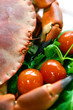 Freshly steamed crab served on fresh salad greens and tomatoes
