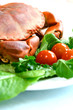 Fresh steamed crab on bed of fresh salad greens and tomatoes