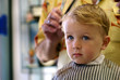 Foto: Young boy getting a haircut Young boy getting a haircut