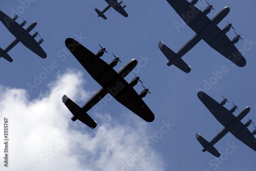 Photo: British Lancaster bombers flying overhead. British Lancaster bombers flying overhead.