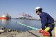 container ship and dock- worker