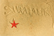 Summer writing on sand and red star