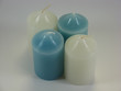assortment of wax candles against a white background assortment of wax candles against a white background