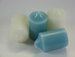 assortment of wax candles against a white background assortment of wax candles against a white background