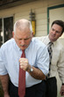 A businessman in a coughing fit A businessman in a coughing fit