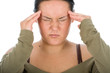 Tired girl with headache pressing her head