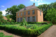 Residential house, villa in the suburbs with formal garden Residential house, villa in the suburbs with formal garden