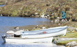 fisherman and wooden boats