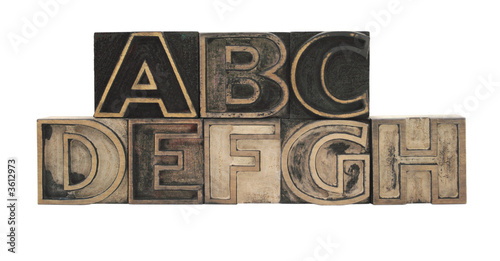 old, inkstained letterpress wood outline type letters A-H