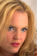 Head shot of an attractive young blond woman.