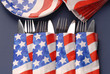 Knives and forks wrapped in a 4th of July settings Knives and forks wrapped in a 4th of July settings