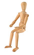 close-up of a sitting  wooden figure isolated on white 