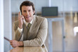 Foto: Young businessman on phone Young businessman on phone