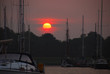 Red orange sun at sunset