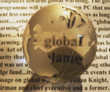 crystal globe on newspaper