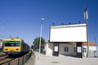 Giant white billboard near trainstation