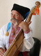 Photo: Senior ukrainian musician with bandura 18 Senior ukrainian musician with bandura 18