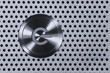 Power Button on Metal Hole Background. Power Button on Metal Hole Background.