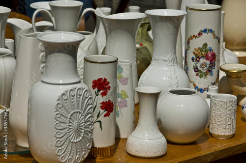 White porcelain vase on a desk at a car boot sale