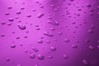 water drop texture in purple background