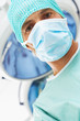 Doctor looking down on patient