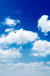 The white clouds on background blue sky.