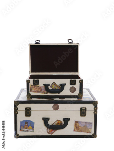 Photo: Two world travelers suitcases isolated over white Two world travelers suitcases isolated over white